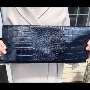 Elie Tahari 
Measurements: 14.5"L x 6.5"W x 1"H